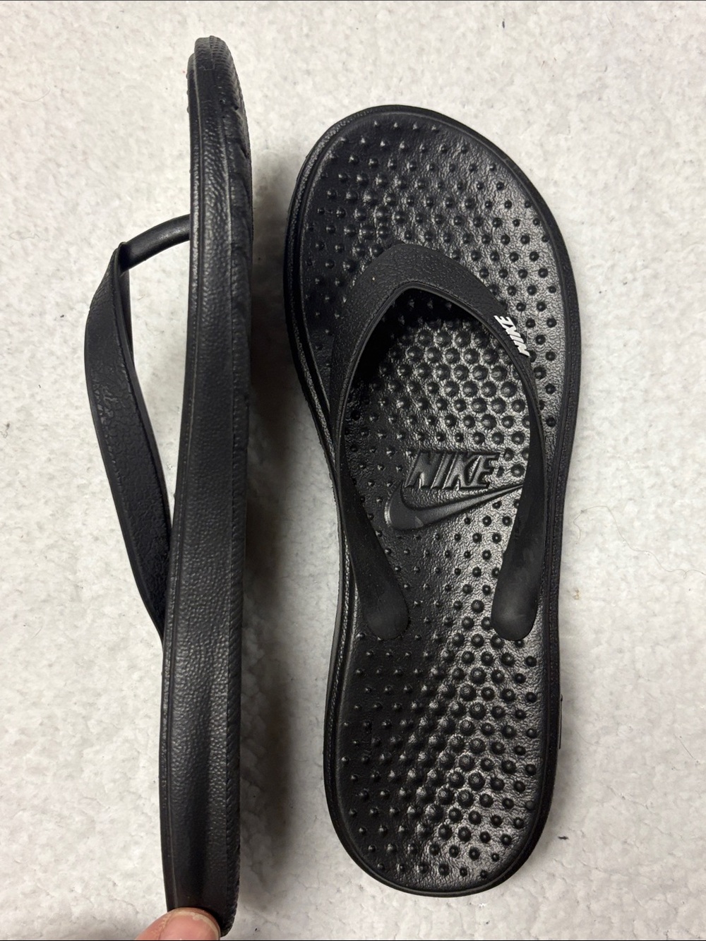 Nike size 3 All-Black Textured Thong Sandals